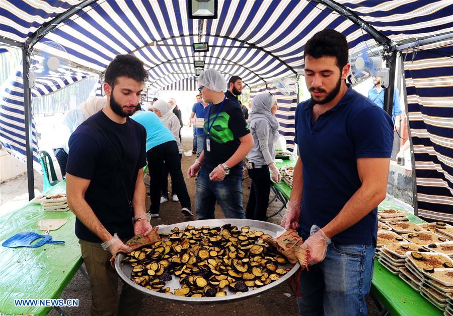 SYRIA-DAMASCUS-RAMADAN-CHARITY-MEALS