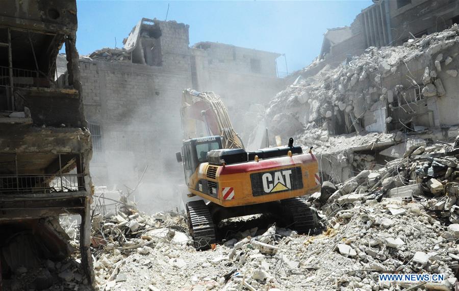 SYRIA-DAMASCUS-HARASTA-RUBBLE-REMOVAL