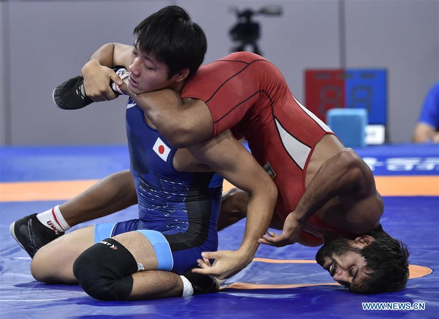 (SP)INDONESIA-JAKARTA-ASIAN GAMES-WRESTLING-MEN'S FREESTYLE 65 KG