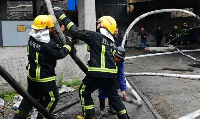 Rescue works continue for seven trapped coal miners in E China