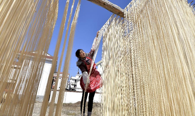 Villagers make handmade traditional dried noodles in China's Shaanxi