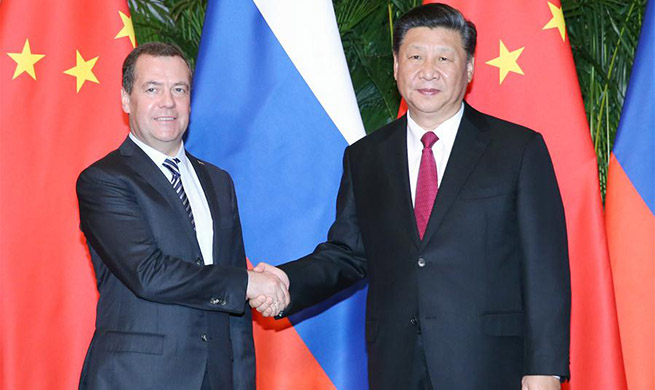 Xi meets Russian prime minister