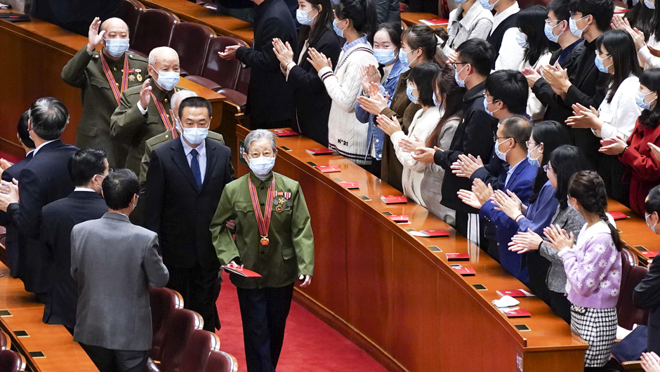 大會前,，志愿軍老同志入場