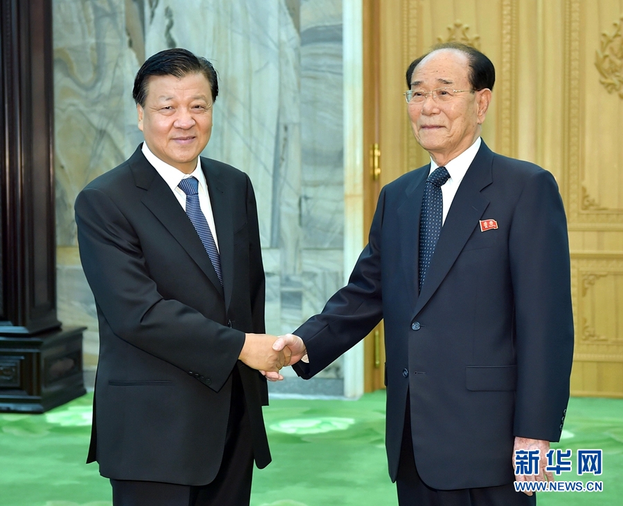 10月10日，正在朝鮮訪問的中共中央政治局常委,、中央書記處書記劉云山在平壤會見朝鮮勞動黨中央政治局常委,、最高人民會議常任委員會委員長金永南。 新華社記者 李濤 攝